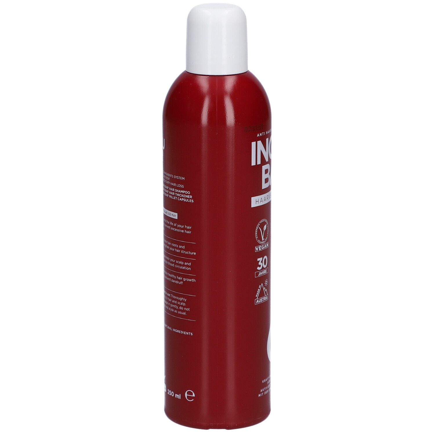 Bouteille rouge à bouchon blanc. Inscription: INGRUBAR Haarverdichter. Label Vegan, 30 ans, logo.