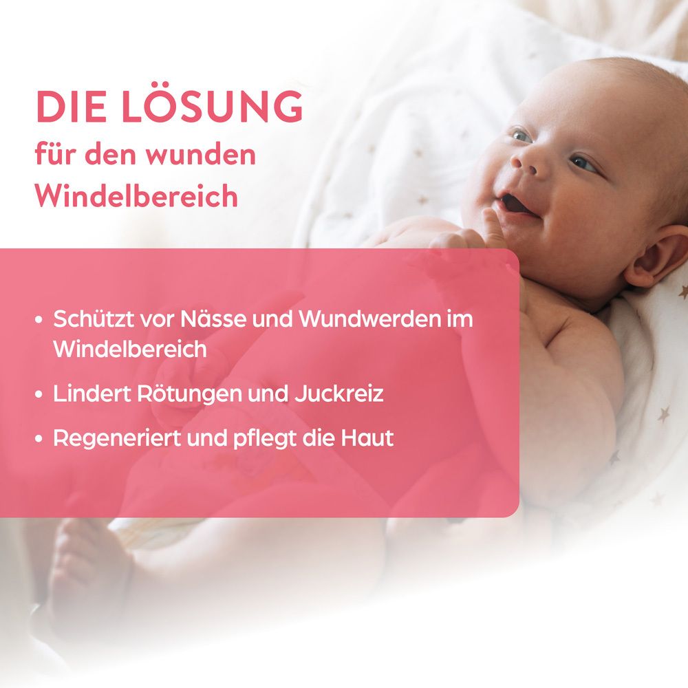 Baby auf Decke. Text: Die Lösung für den wunden Windelbereich. Produktvorteile.