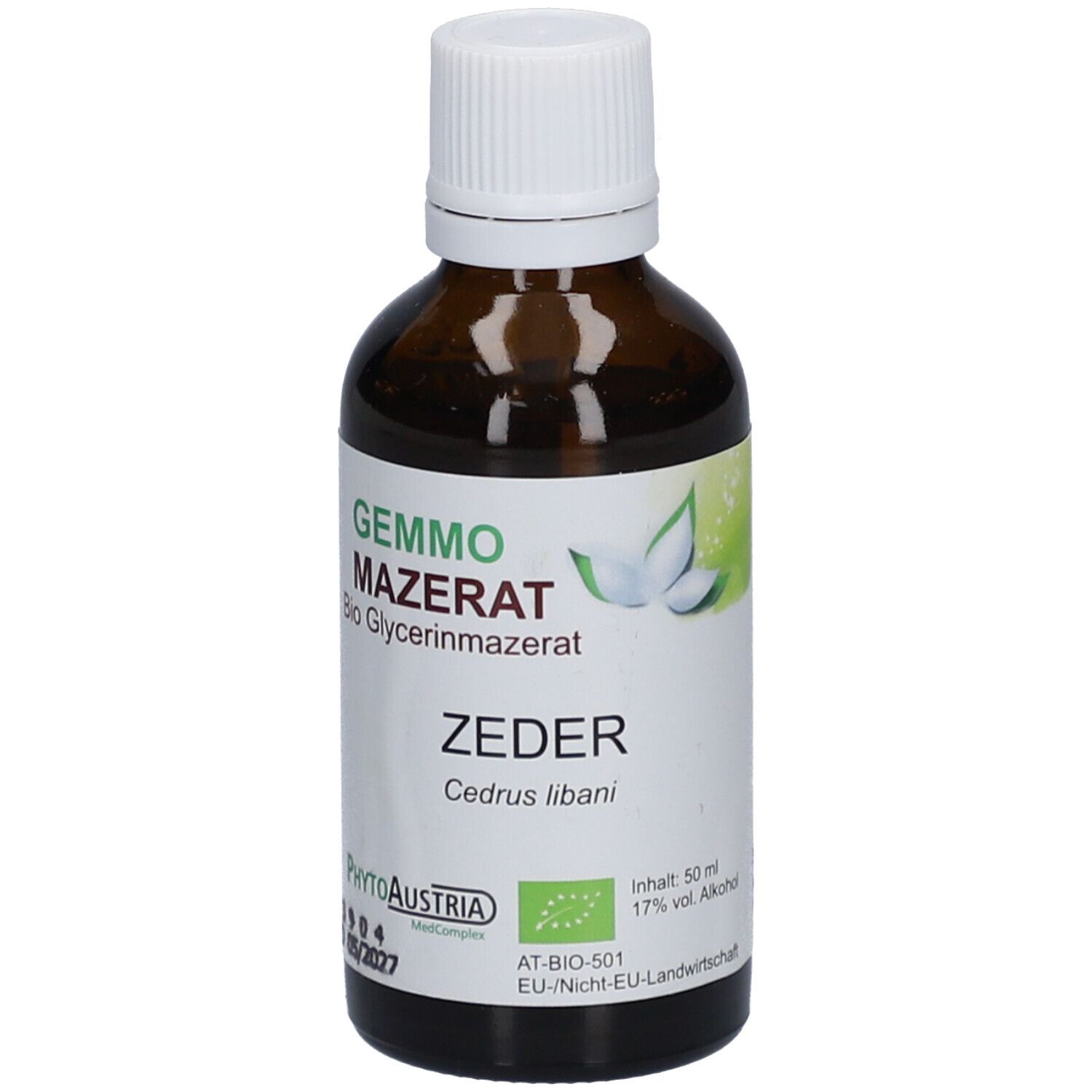 Braune Glasflasche mit weißem Deckel. Etikett mit Produktnamen, Zertifizierung und Inhaltsangaben. Gemmo Mazerat Zeder.