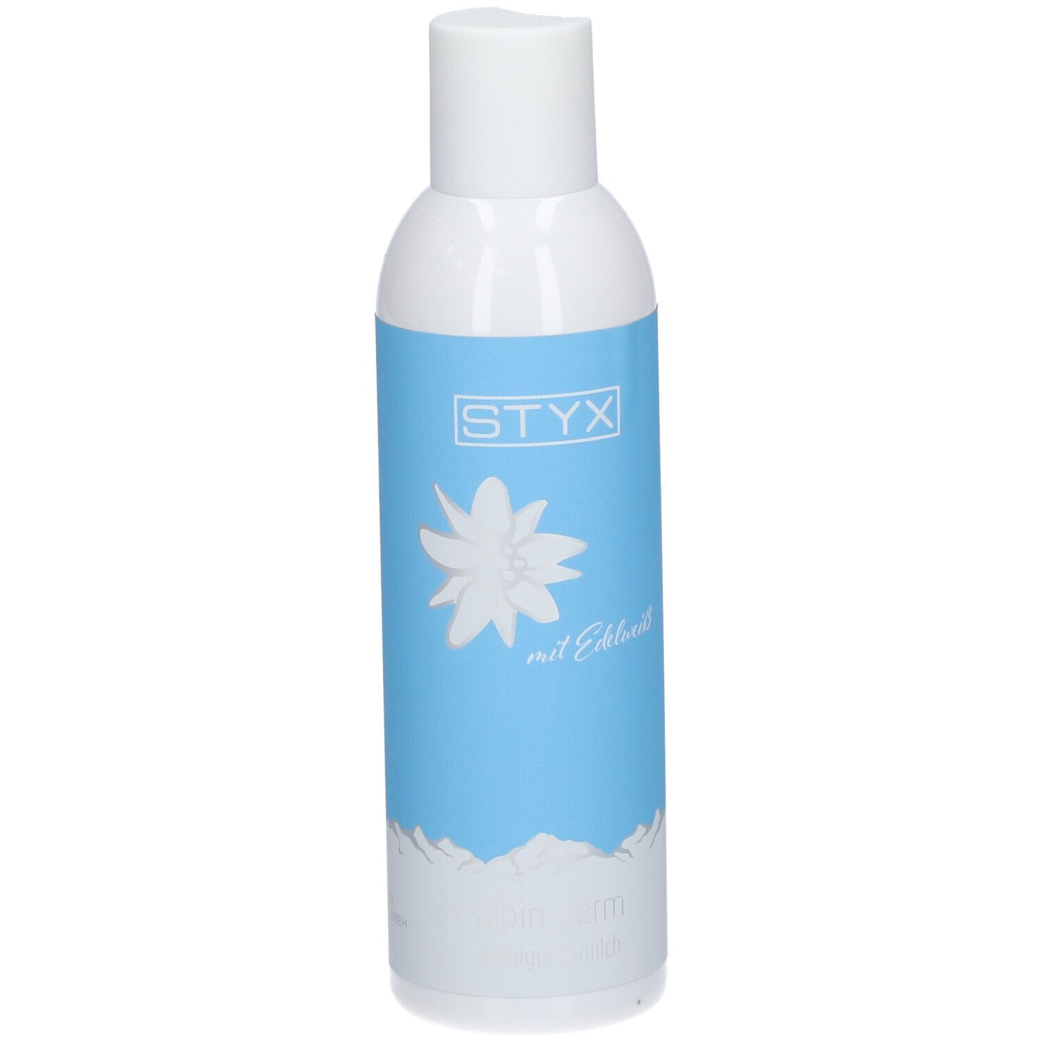 Flacon blanc avec étiquette bleue. Logo STYX, fleur d'edelweiss, texte: mit Edelweiß, alpin derm Reinigungsmilch.