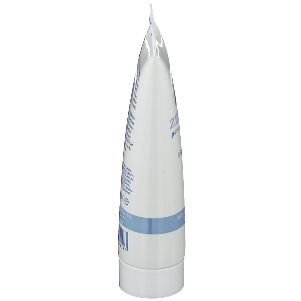 Vue latérale du tube. Tube blanc avec texte bleu. Fermé en haut, bouchon blanc en bas.