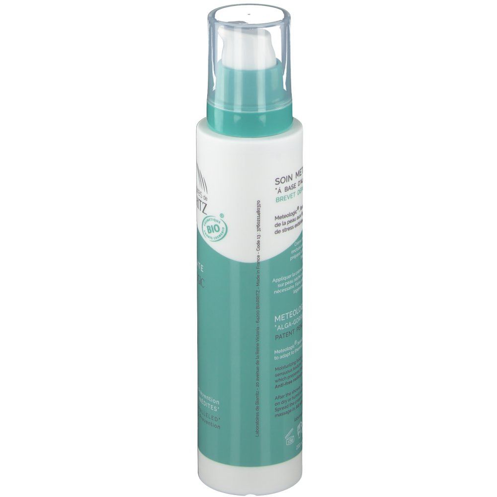 Flacon blanc et turquoise avec pompe doseuse. Inscription: Laboratoires de Biarritz, Crème hydratante Meteo Logic, Corps. Certification Bio.