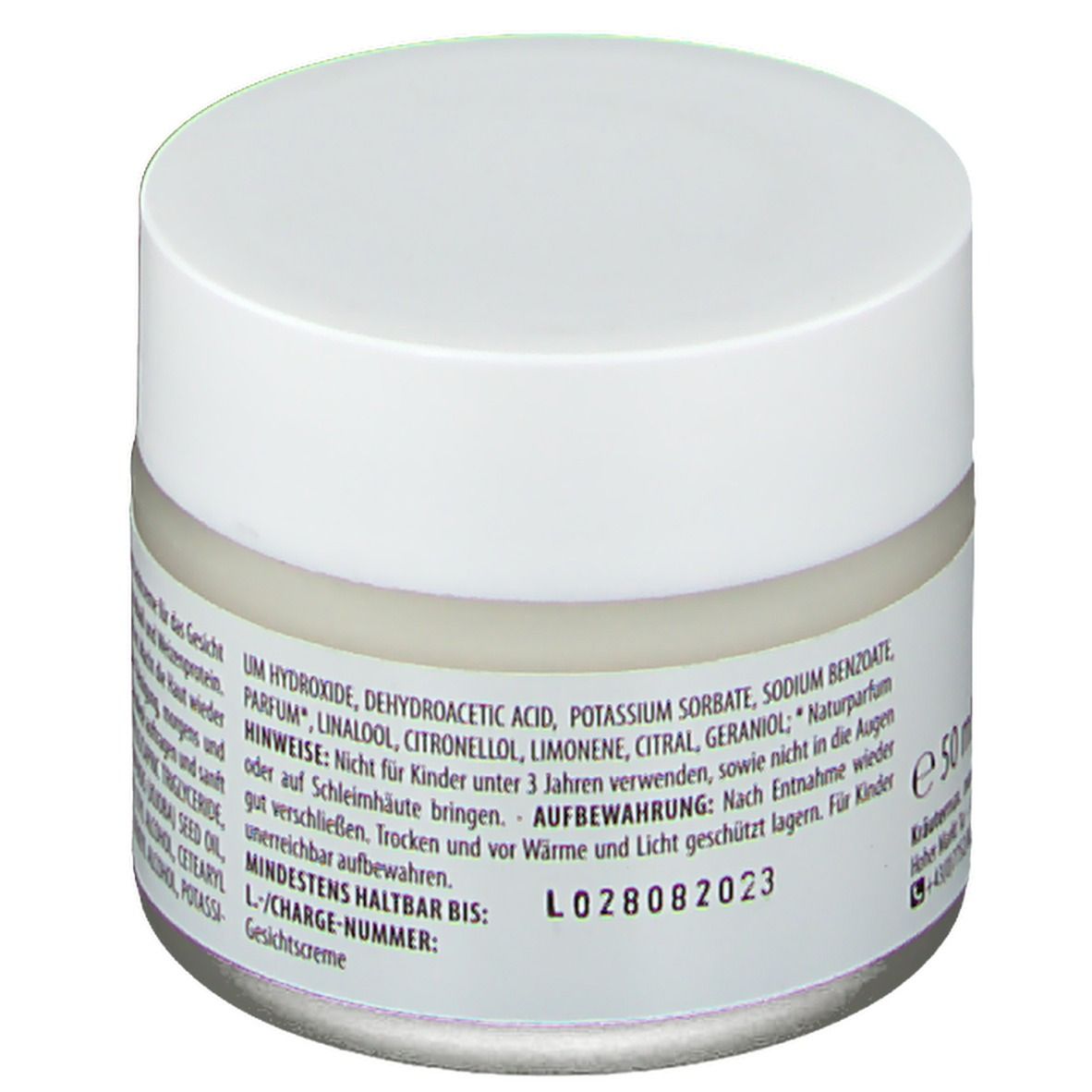 Pot de crème avec couvercle blanc. Dos avec texte : Gesichtscreme Relax Plus. Date de péremption et numéro de lot.