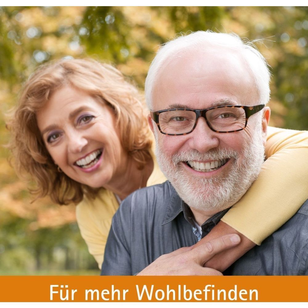 Couple âgé souriant. Texte: Pour plus de bien-être.