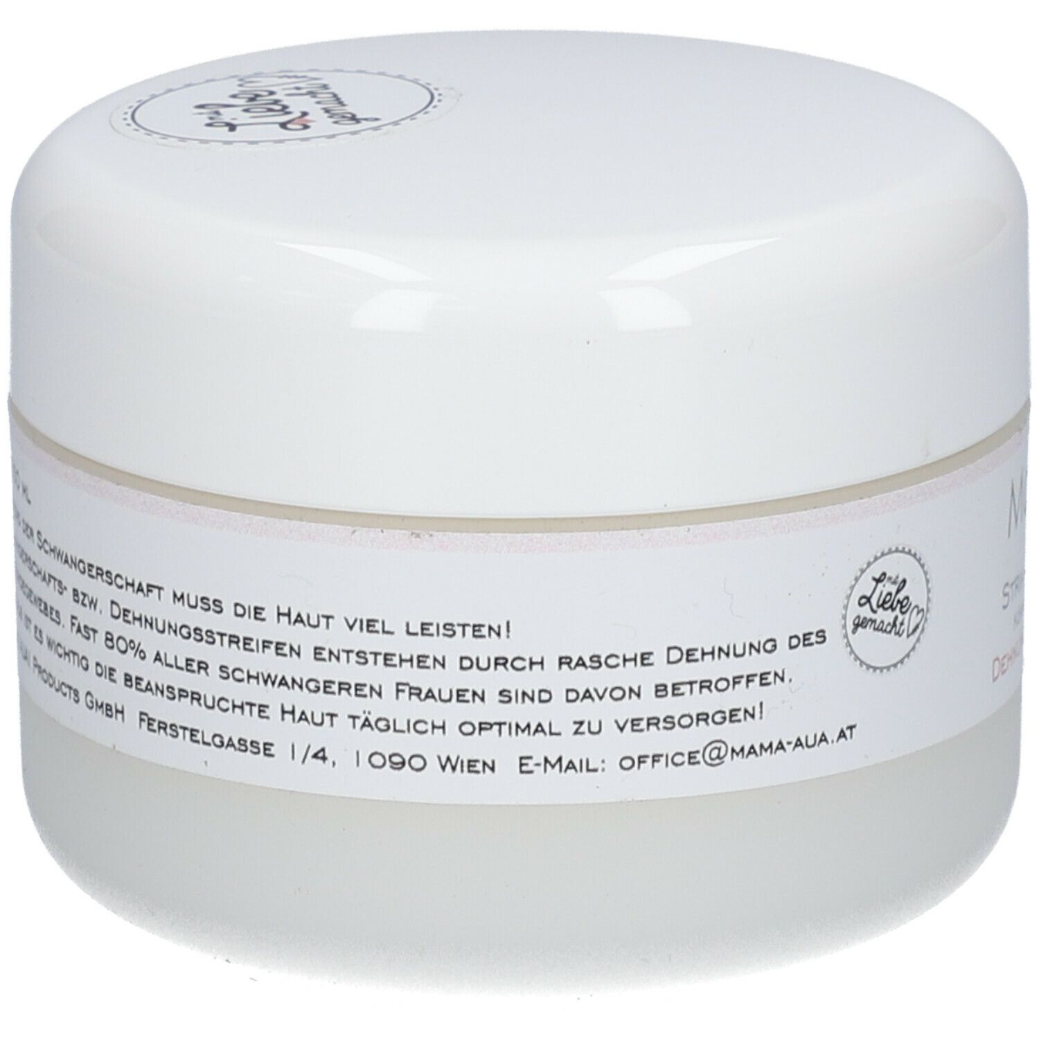 Pot blanc de crème Mama sein Stria. Inscription: Mama sein, Stria Creme, Dehnungsstreifen. Texte sur l'étiquette.