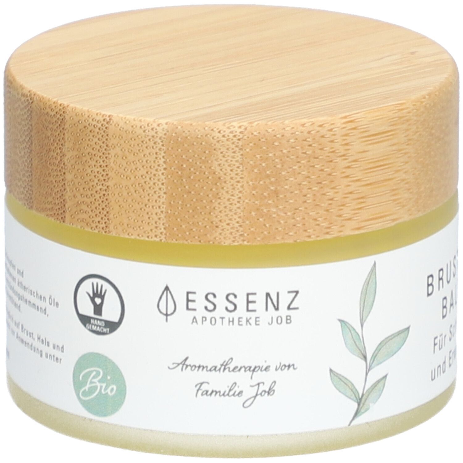 Creme-Tiegel mit Holzdeckel. Aufschrift: ESSENZ, Apotheke Job, Bio. Handgemacht-Siegel. Aromatherapie von Familie Job.