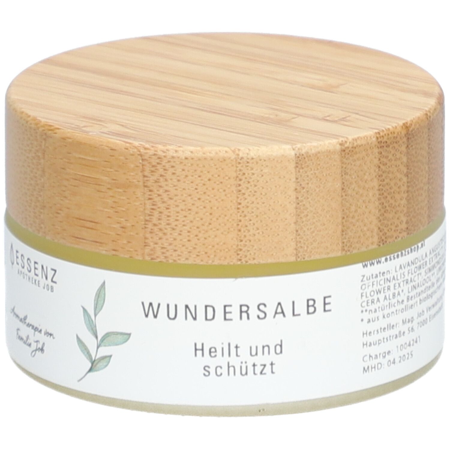 Pot de crème avec couvercle en bois. Inscription : Wundersalbe, Heilt und schützt. Logo Essenz Apotheke Job.