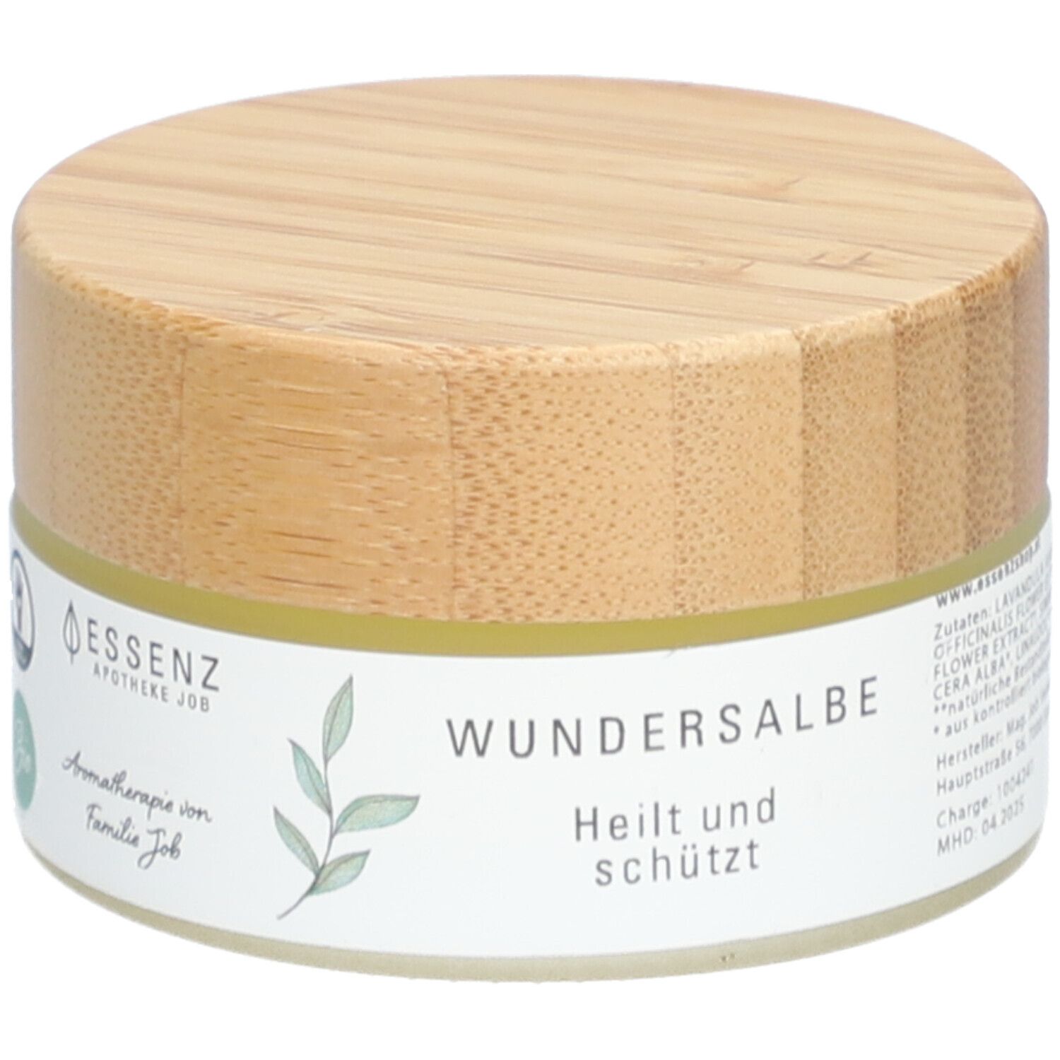 Pot de crème avec couvercle en bois. Inscription : Wundersalbe, Heilt und schützt. Logo Essenz Apotheke Job. Texte : Aromathérapie de la famille Job.