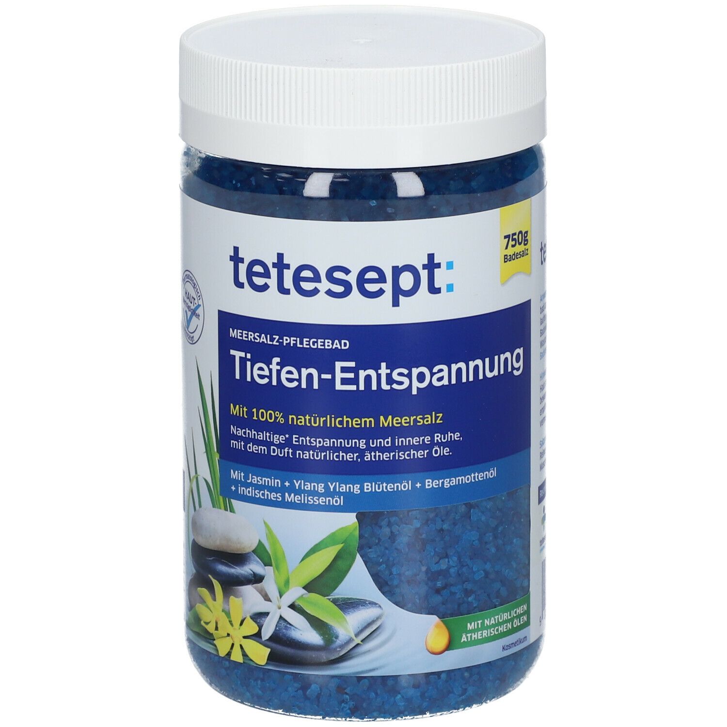 tetesept® MEERSALZ-PFLEGEBAD Tiefen-Entspannung en pot. Cristaux de sel de bain bleus. Couvercle blanc. Inscription : 750g de sel de bain.