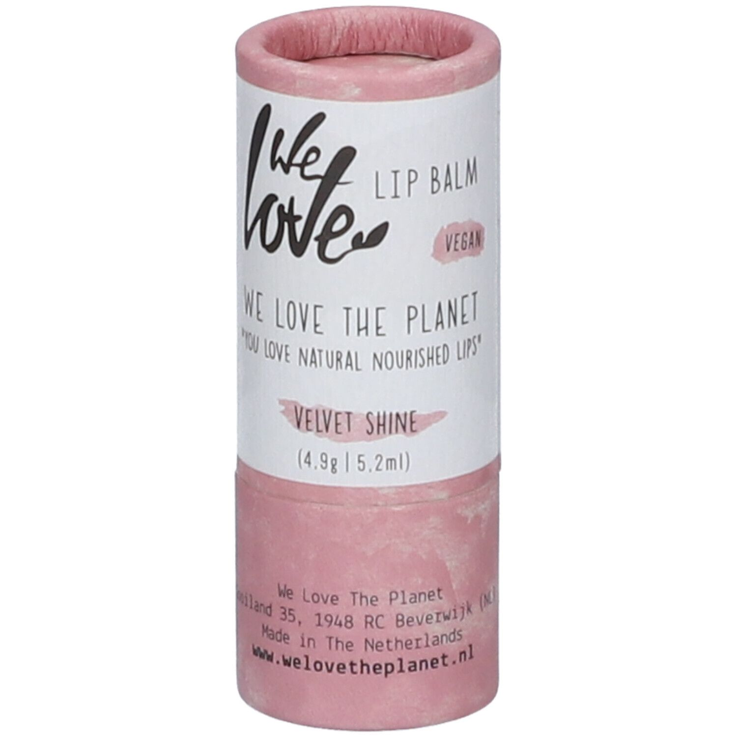 Emballage de baume à lèvres cylindrique, rose et blanc. Inscription : We Love, Lip Balm, Velvet Shine, Vegan. Avec adresse et site web.