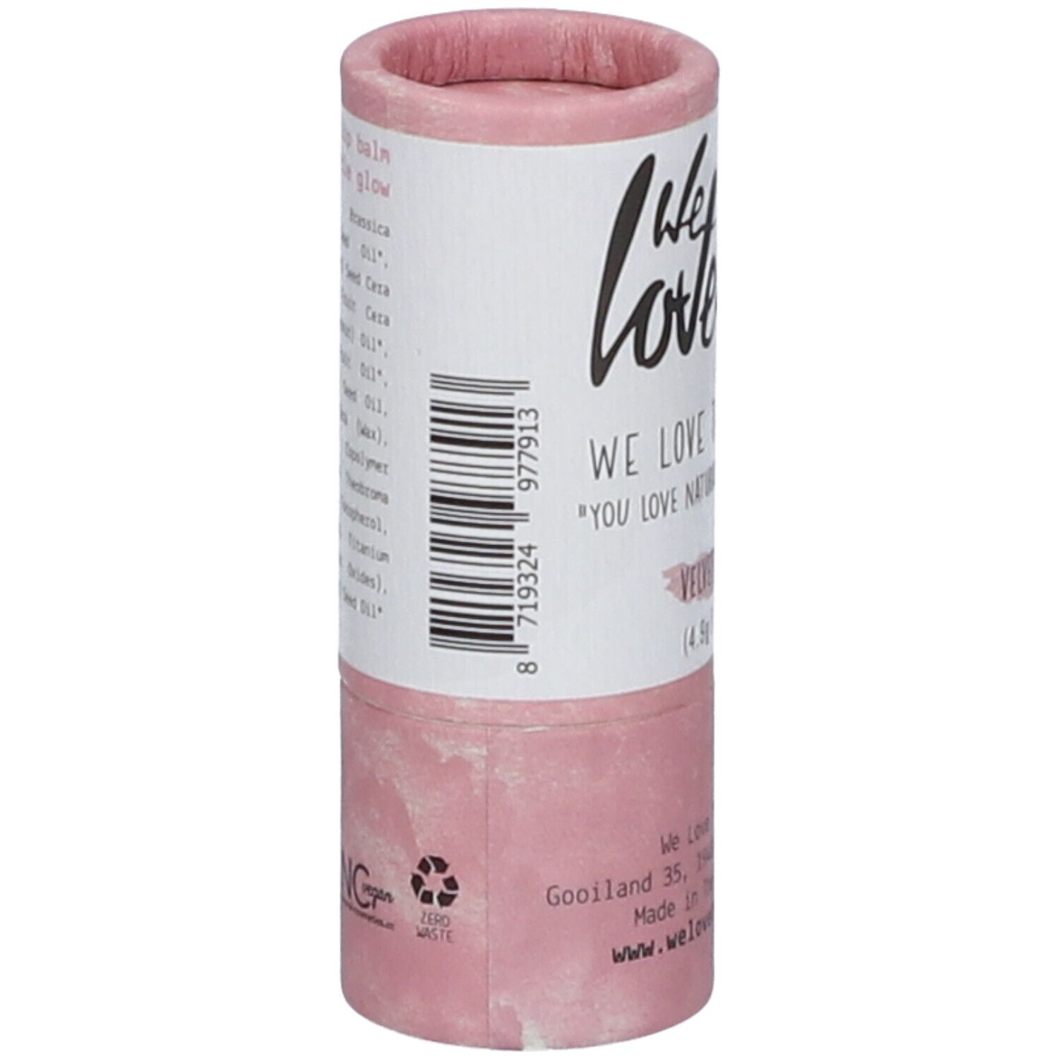 Emballage de baume à lèvres cylindrique, rose et blanc. Inscription : We Love, Lip Balm, Velvet Shine, Vegan. Avec code-barres et ingrédients.