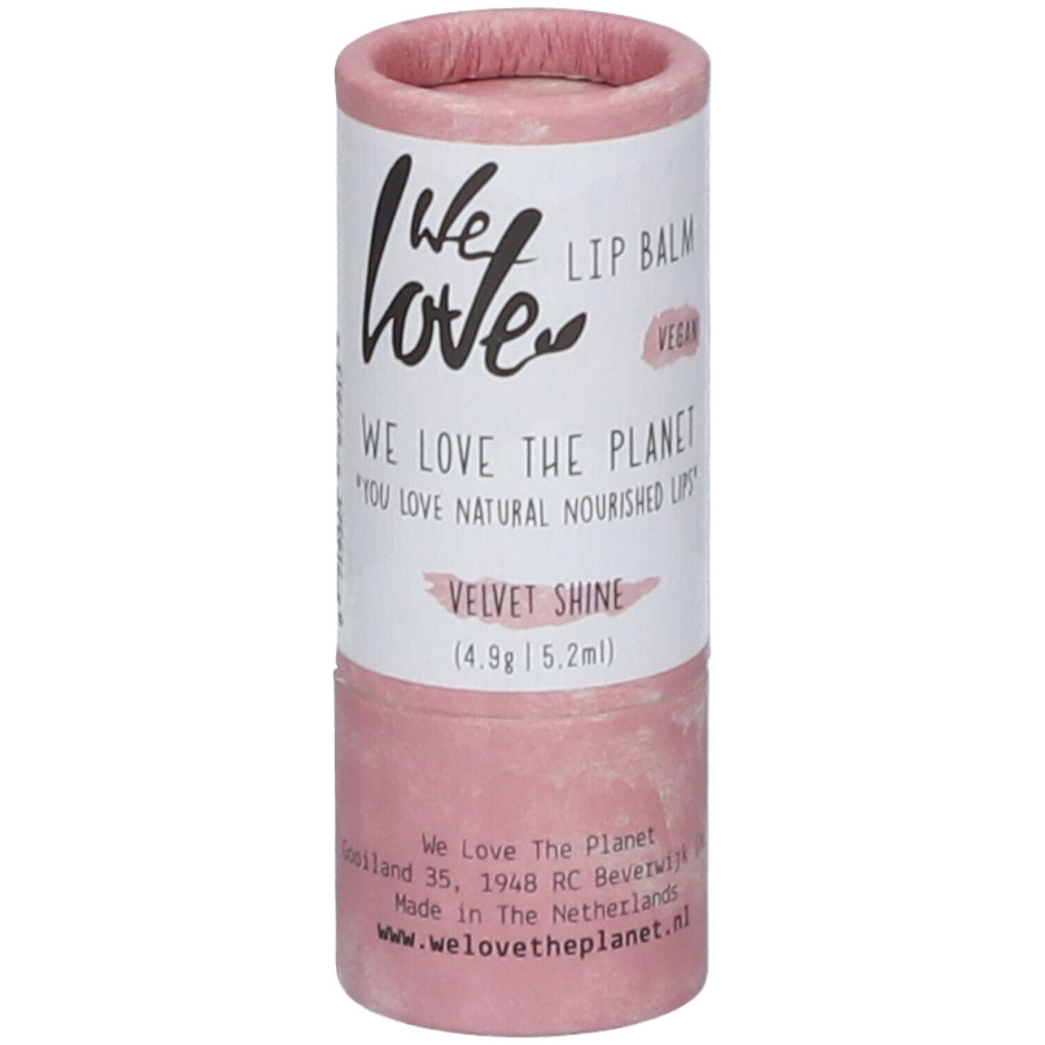 Emballage de baume à lèvres cylindrique, rose et blanc. Inscription : We Love, Lip Balm, Velvet Shine, Vegan. Avec adresse et site web.