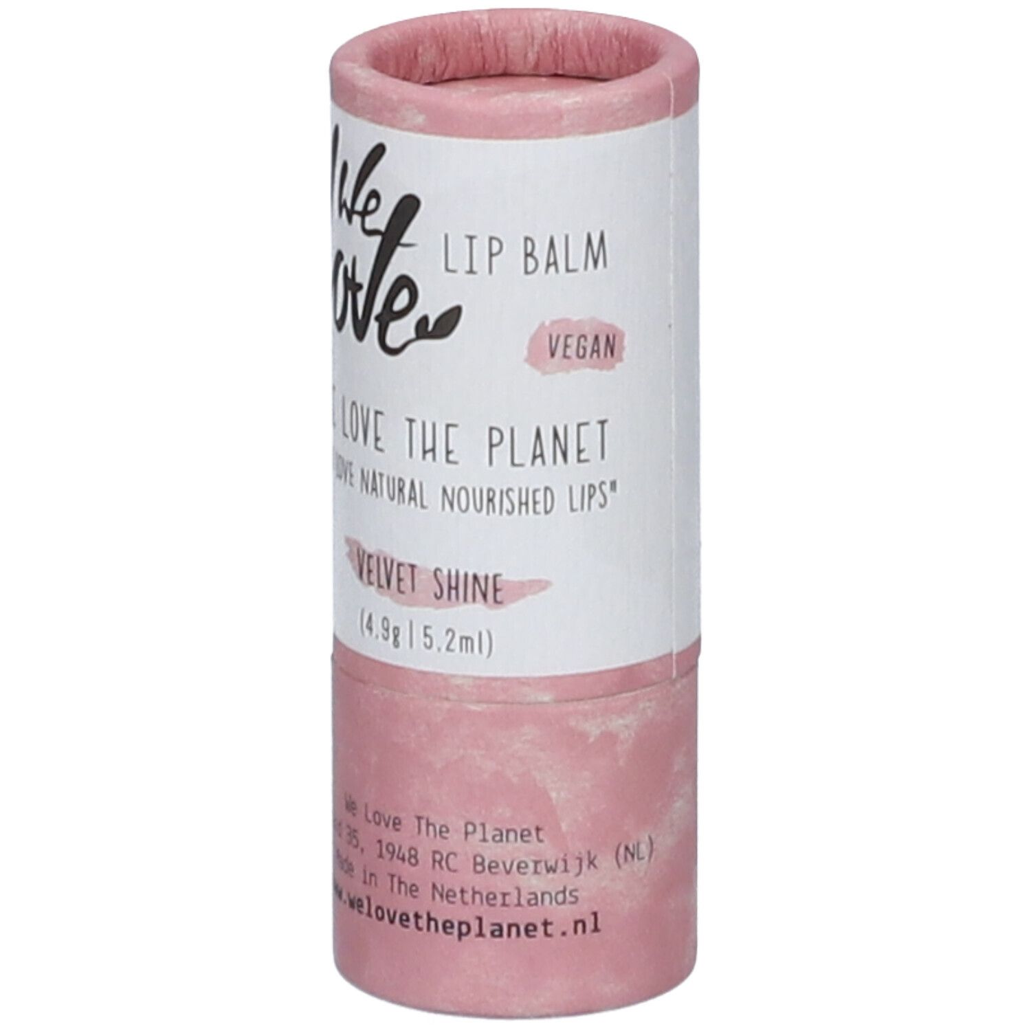 Emballage de baume à lèvres cylindrique, rose et blanc. Inscription : We Love, Lip Balm, Velvet Shine, Vegan. Avec adresse et site web.