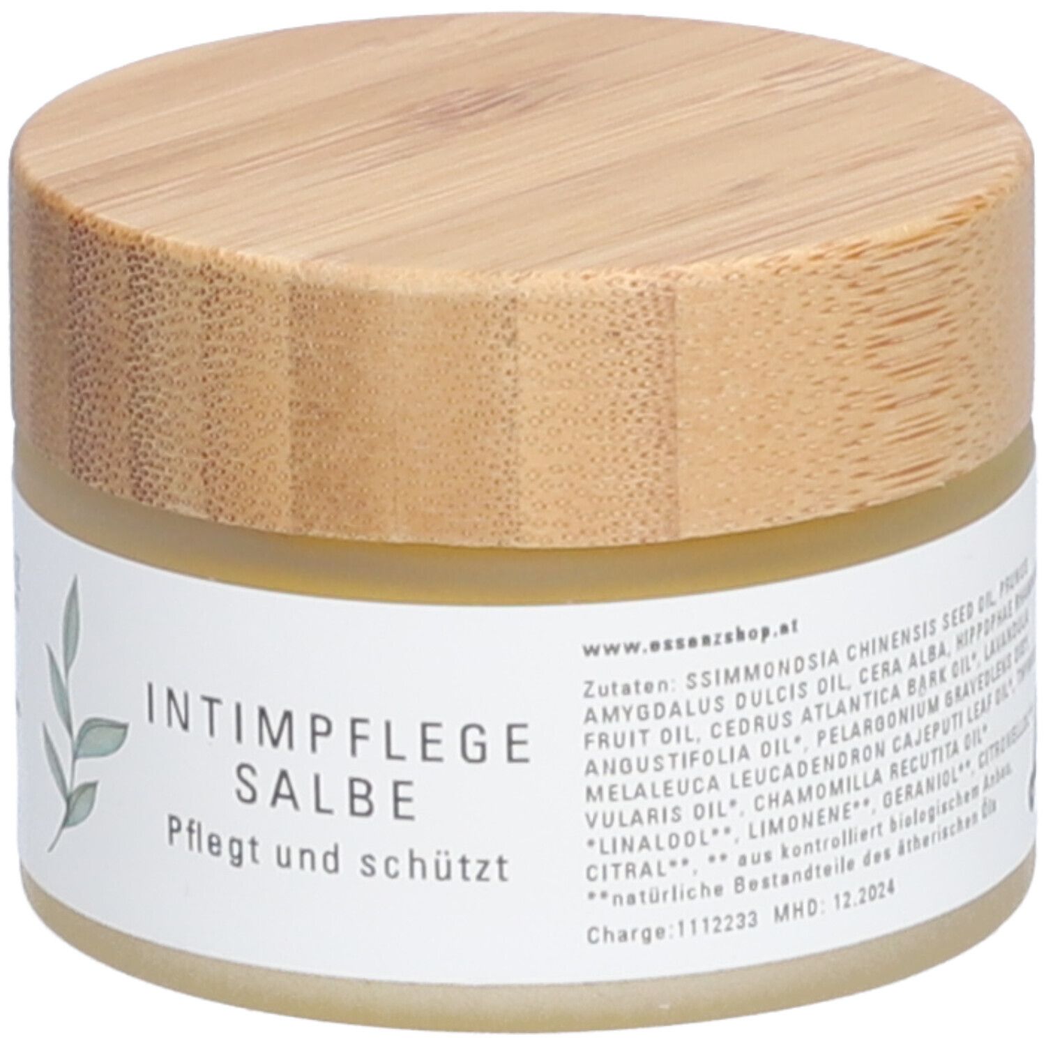 Pot de crème avec couvercle en bois. Inscription : Intimpflege Salbe. Soigne et protège. Liste des ingrédients.