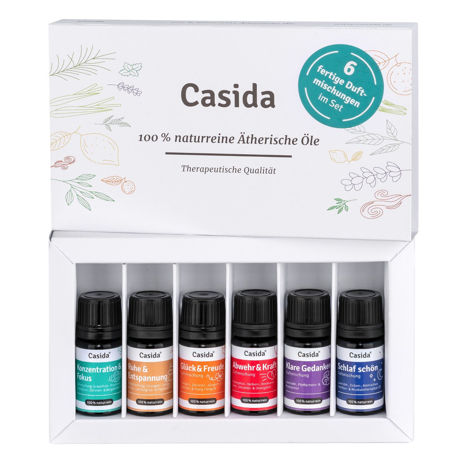 Set mit sechs Flaschen ätherischer Öle. Schwarze Flaschen mit farbigen Etiketten in einer weißen Box. Aufschrift: Casida.