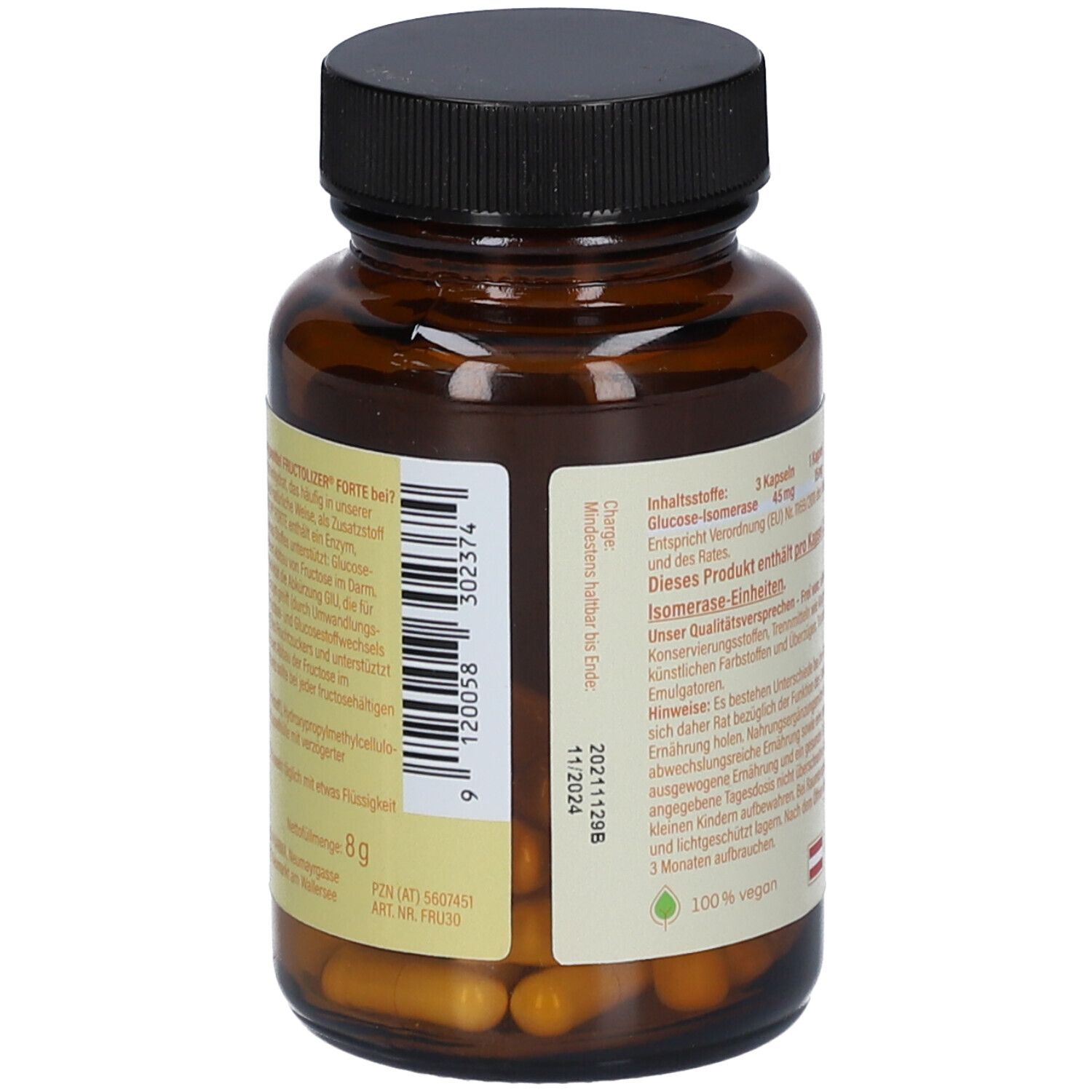 Flacon en verre brun avec bouchon noir. Dos avec texte, ingrédients et numéro de lot. 100% végétalien.