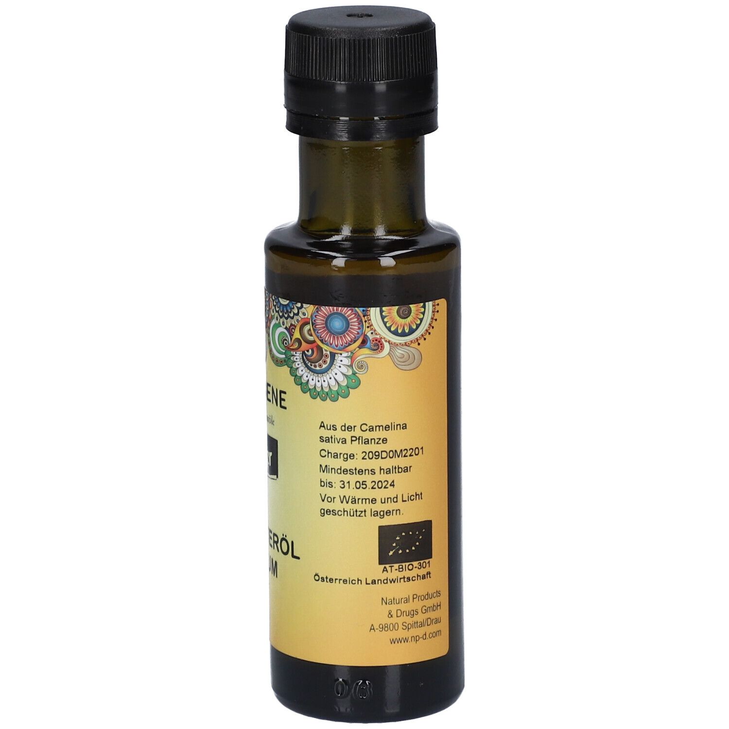 Bouteille en verre brun avec bouchon noir. Étiquette avec texte, numéro de lot, date de péremption, label BIO.