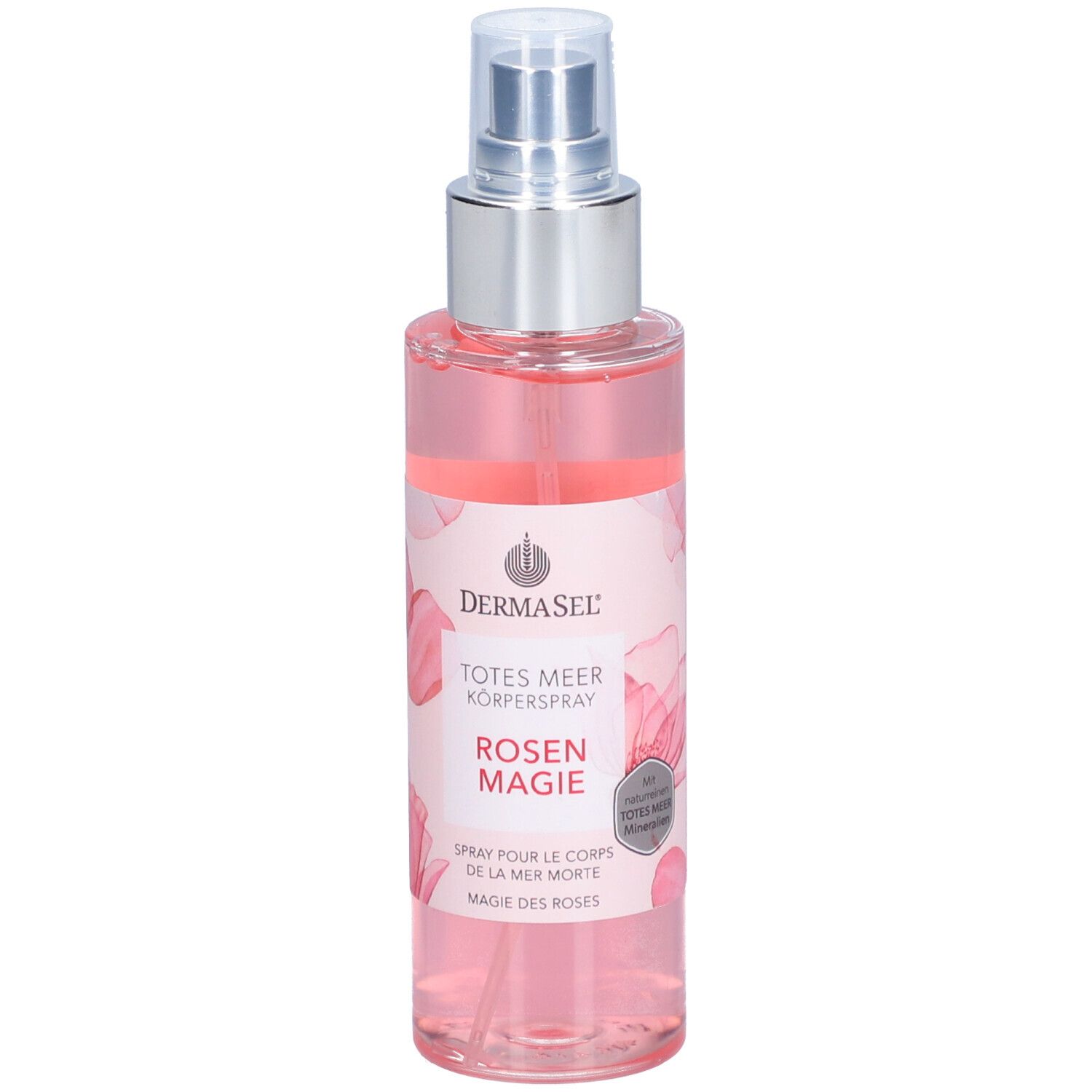 Spray pour le corps avec vaporisateur. Liquide rose dans une bouteille transparente. Inscription: DERMASEL, TOTES MEER KÖPERSPRAY ROSEN MAGIE.