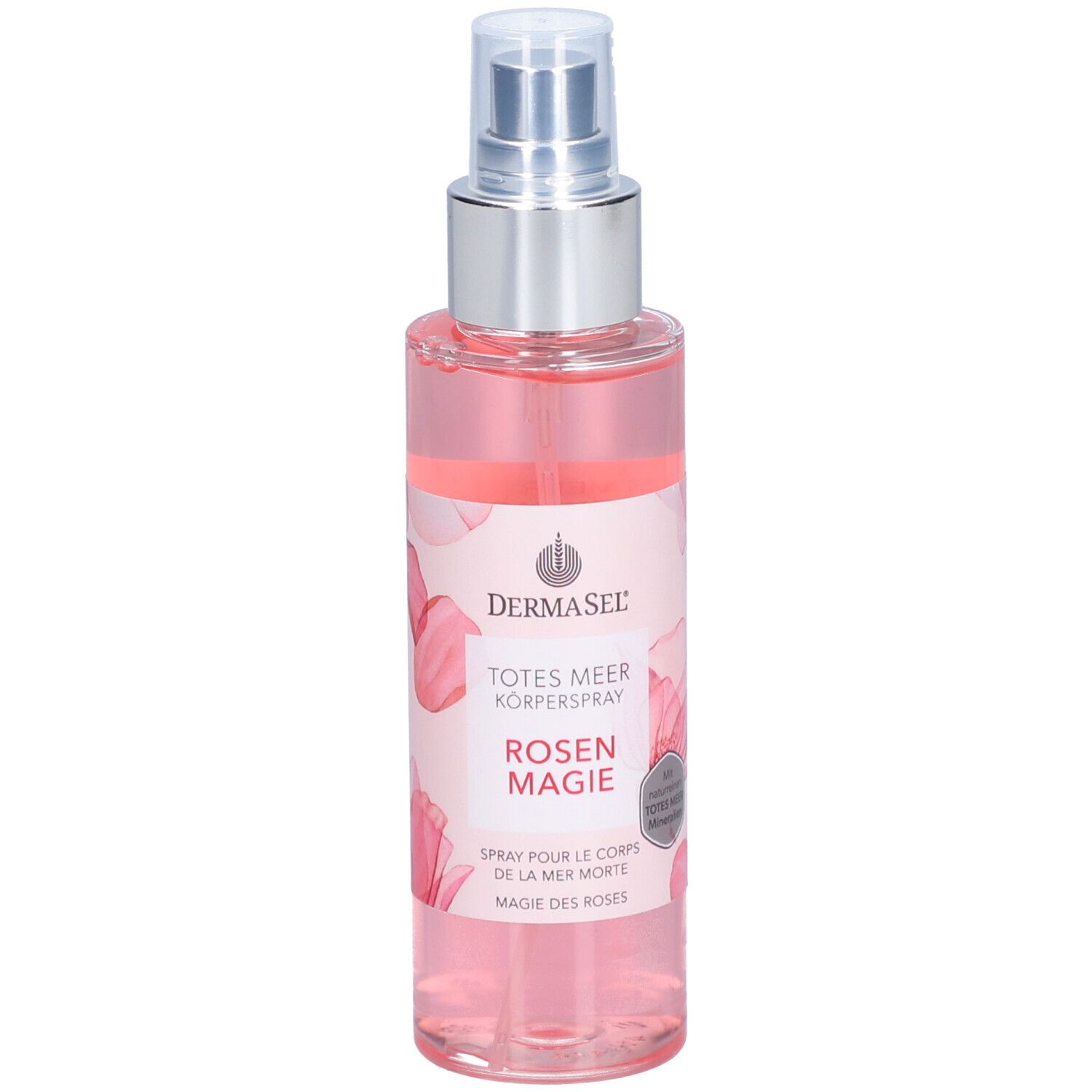Spray pour le corps avec vaporisateur. Liquide rose dans une bouteille transparente. Inscription: DERMASEL, TOTES MEER KÖPERSPRAY ROSEN MAGIE.