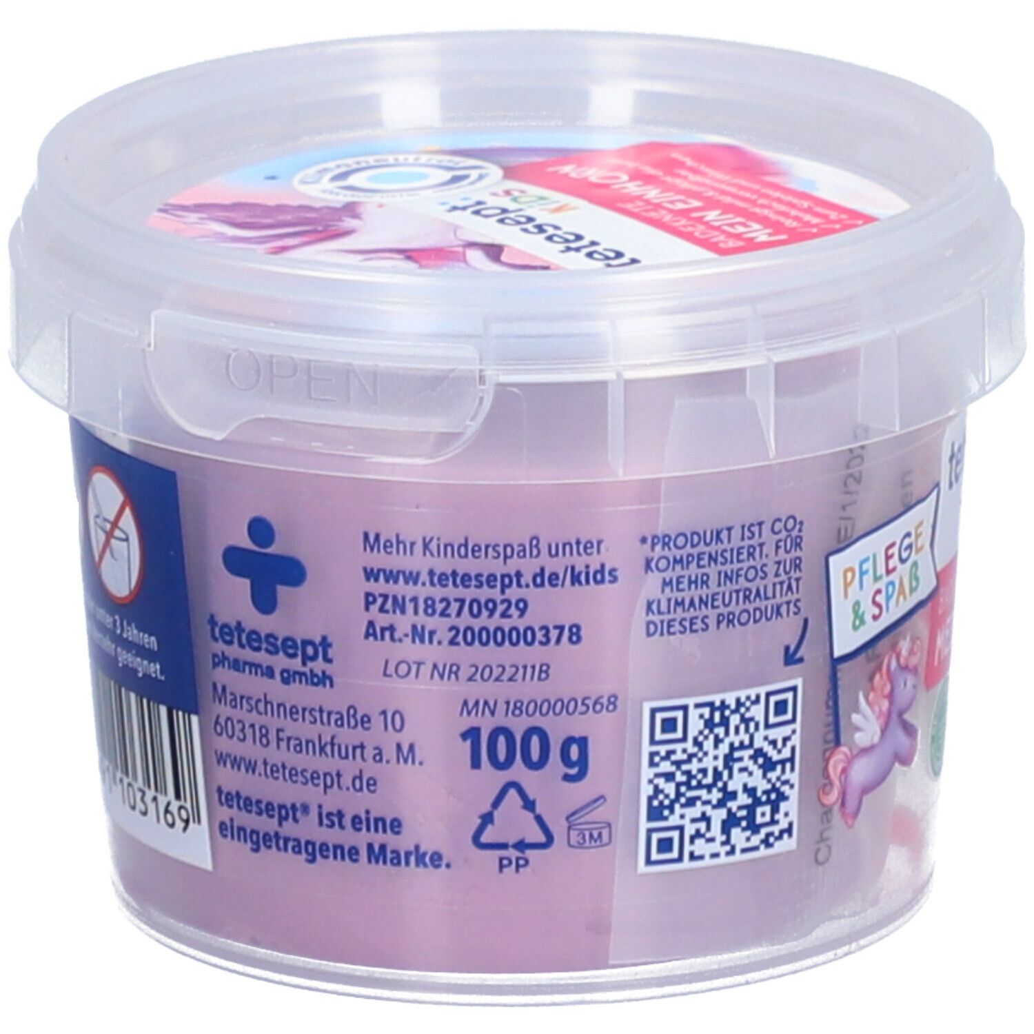 Récipient transparent avec pâte à modeler. Informations telles que fabricant, numéro d'article et poids (100g) sur le côté.