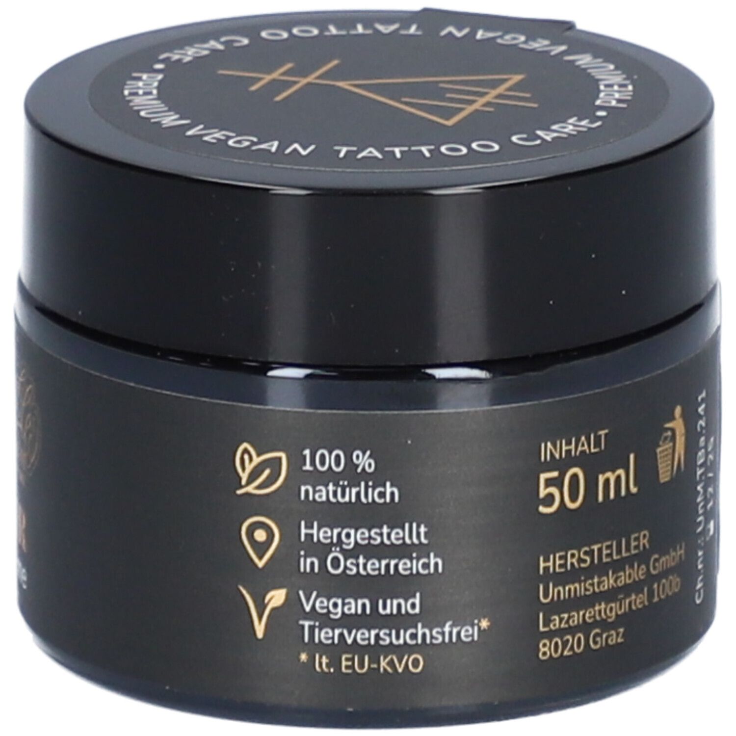 Pot noir avec texte: 50 ml. Autocollant avec informations fabricant et logos: 100% naturel, vegan, sans tests sur animaux.