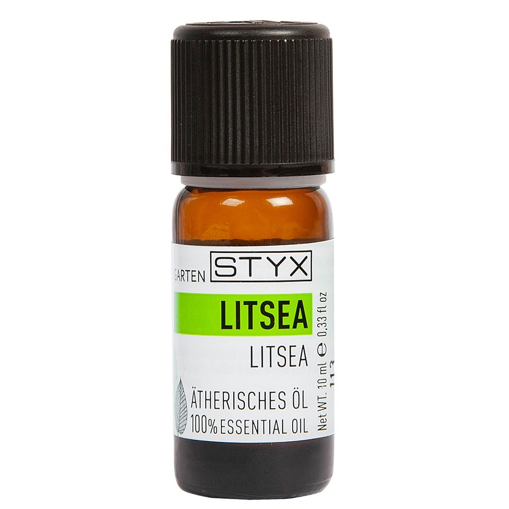 Braune Glasflasche mit schwarzem Deckel. Etikett mit STYX, Litsea, ätherisches Öl. 10 ml.