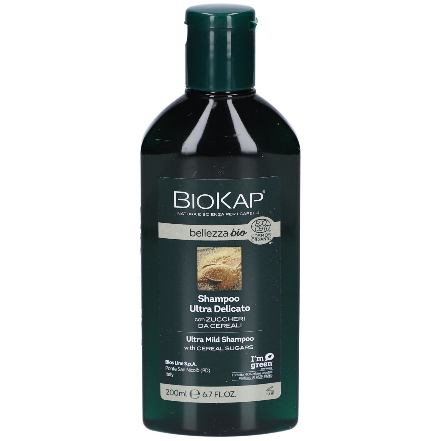 Flacon vert de shampooing BioKap Bellezza Bio Ultra Delicato aux sucres de céréales. Label bio.