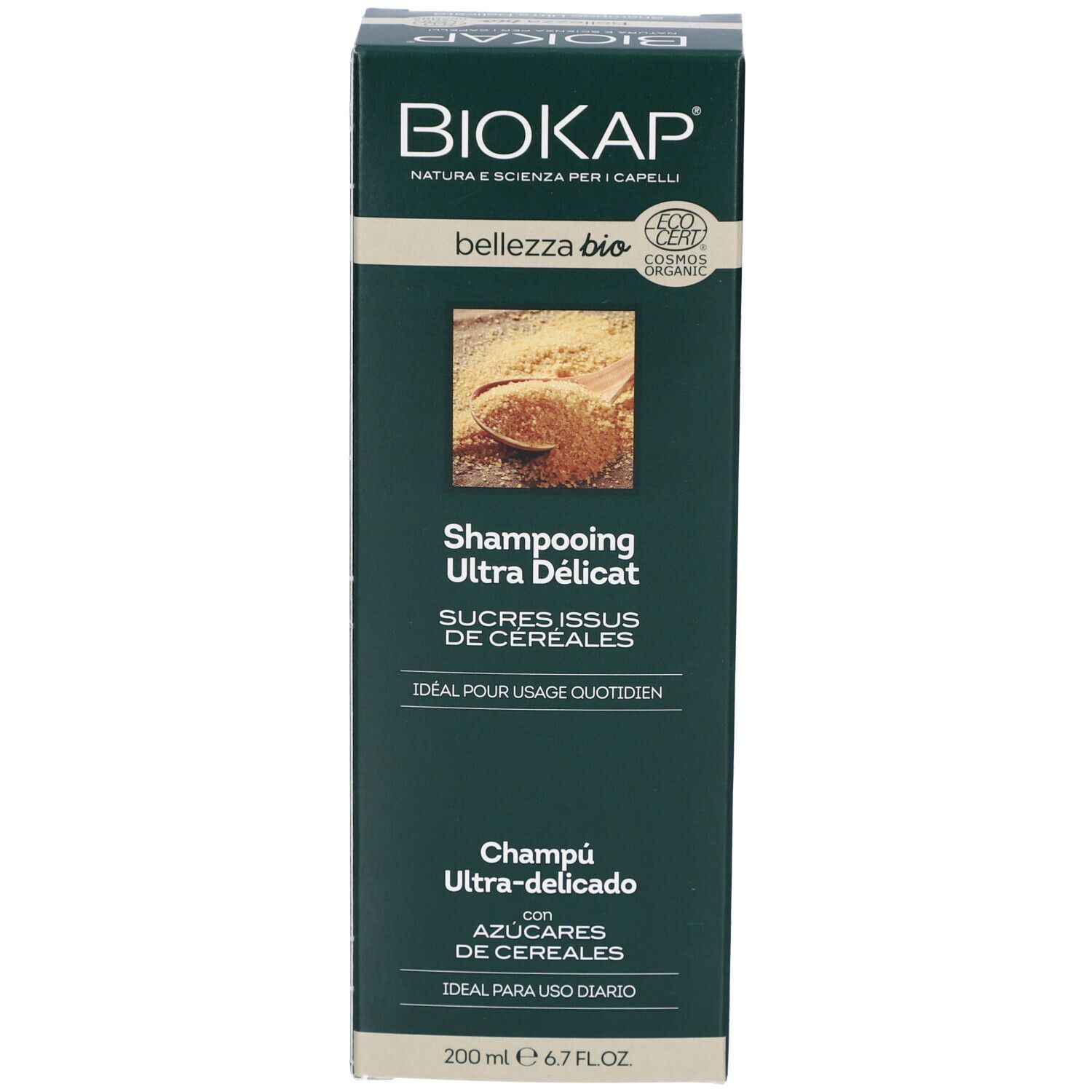 Face avant de l'emballage du shampooing. Inscription : Shampooing Ultra Délicat aux sucres de céréales.