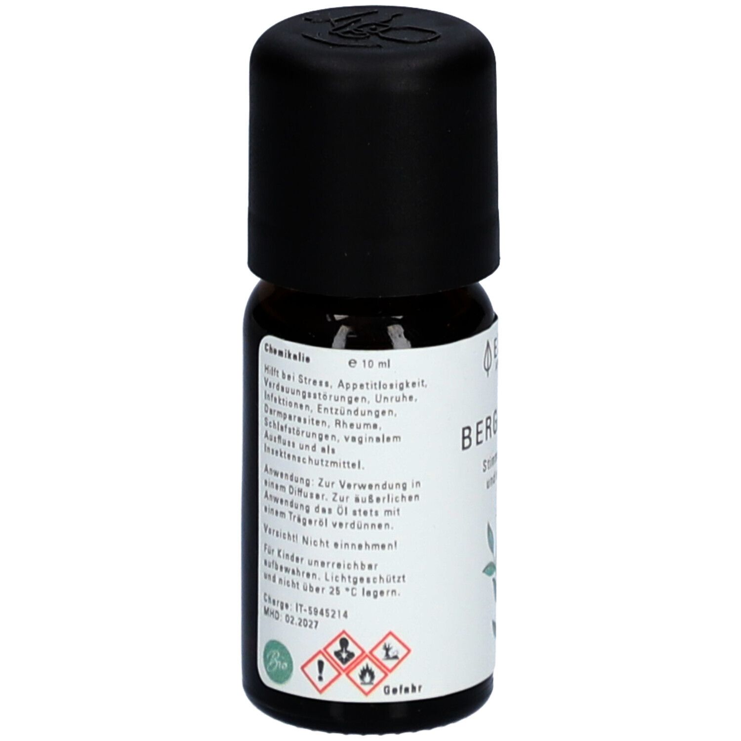 Flacon en verre brun avec bouchon noir. Étiquette avec ingrédients et avertissements.