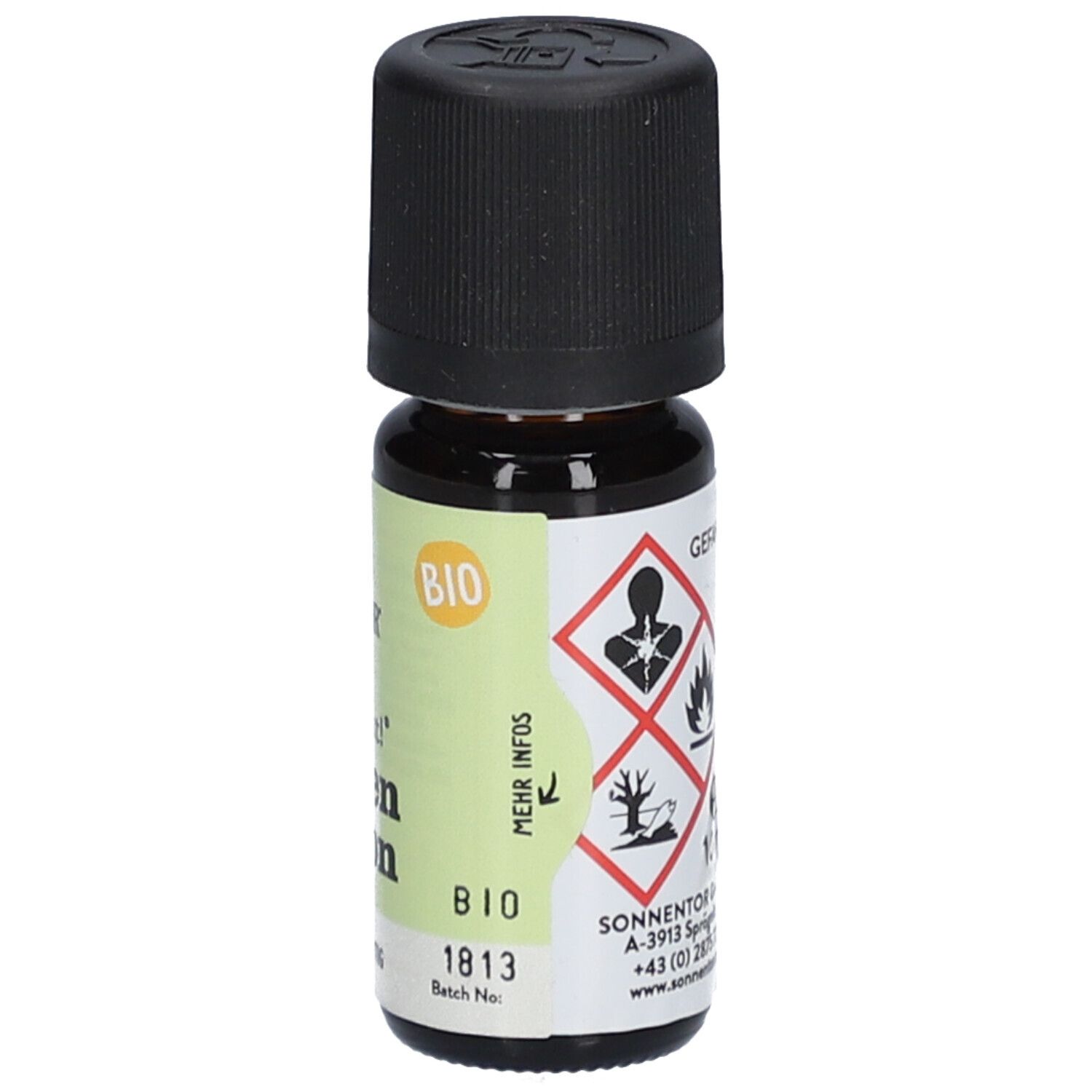 Flacon en verre brun avec bouchon noir. Étiquette avec symboles de danger, "Sonnentor", "BIO" et numéro de lot.