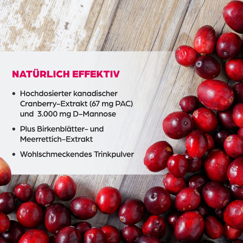 Nahaufnahme von Cranberrys auf Holz. Text: Natürlich effektiv. Cranberry-Extrakt, D-Mannose, Birkenblätter- und Meerrettich-Extrakt.