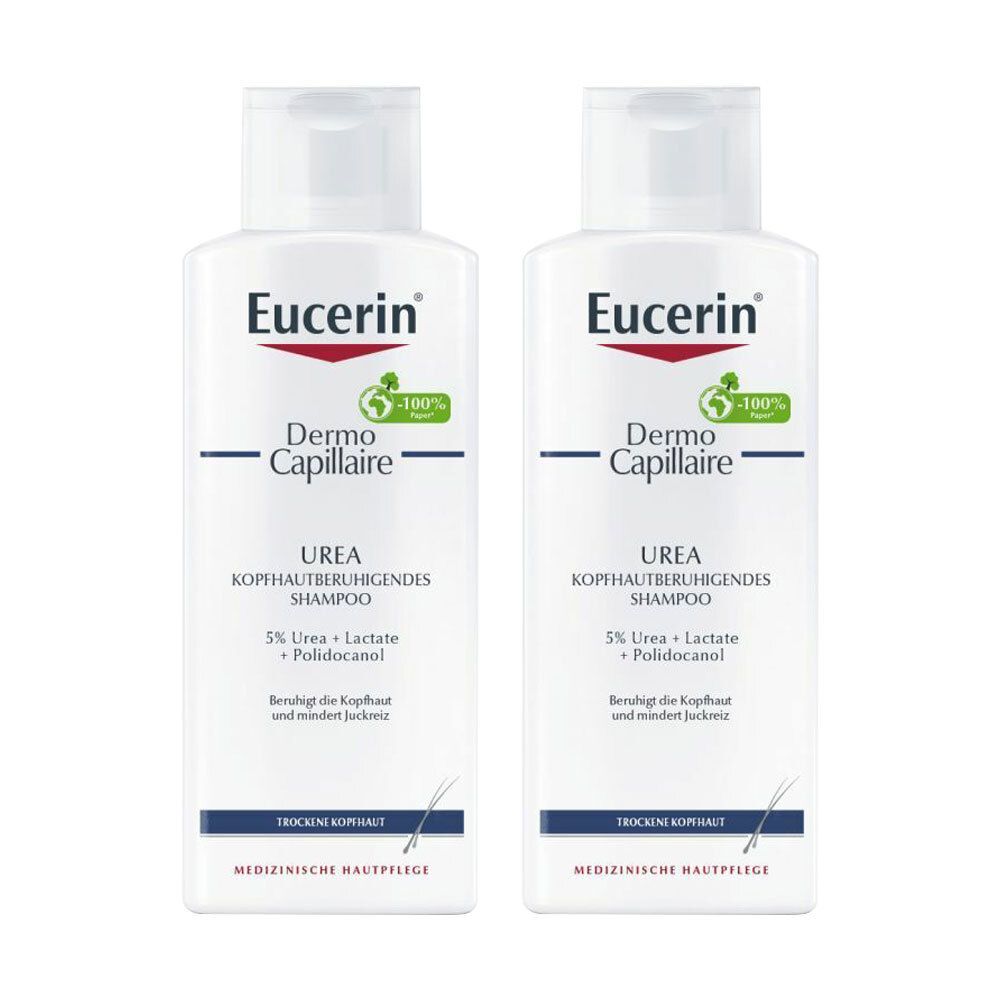 Deux flacons de shampooing Eucerin DermoCapillaire Urea côte à côte, flacons blancs avec étiquettes bleues et rouges.