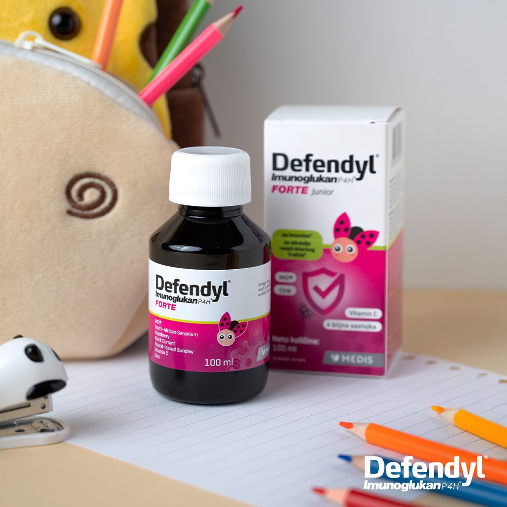 Defendyl-Imunoglukan P4H® FORTE Junior, Flasche und Schachtel. Rosa Verpackung mit Stiften und Zubehör.