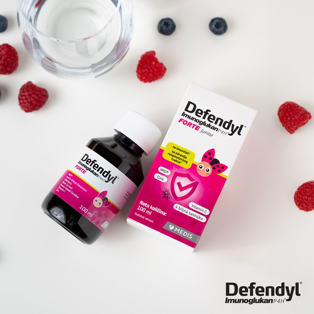 Defendyl-Imunoglukan P4H® FORTE Junior, Flasche und Schachtel. Rosa Verpackung mit Beeren.