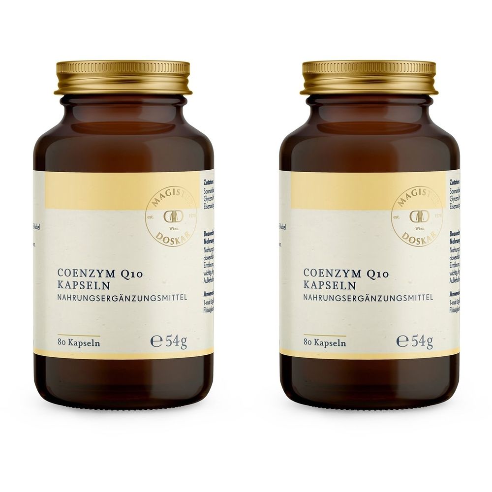 Deux flacons en verre brun avec des couvercles dorés. Les étiquettes indiquent "COENZYM Q10 KAPSELN" et "NAHRUNGSERGÄNZUNGSMITTEL".
