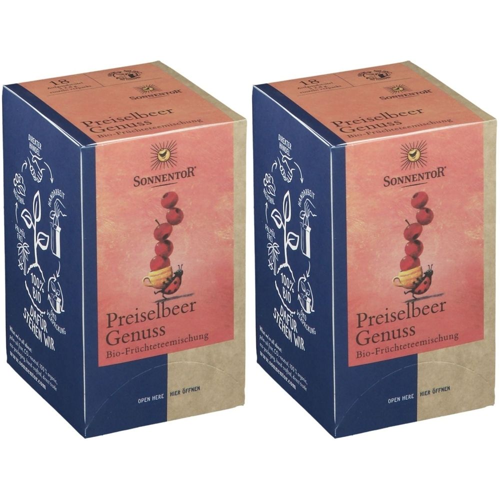 Deux boîtes rectangulaires avec l'inscription "Preiselbeer Genuss". Inscription "Sonnentor". Illustration de canneberges.
