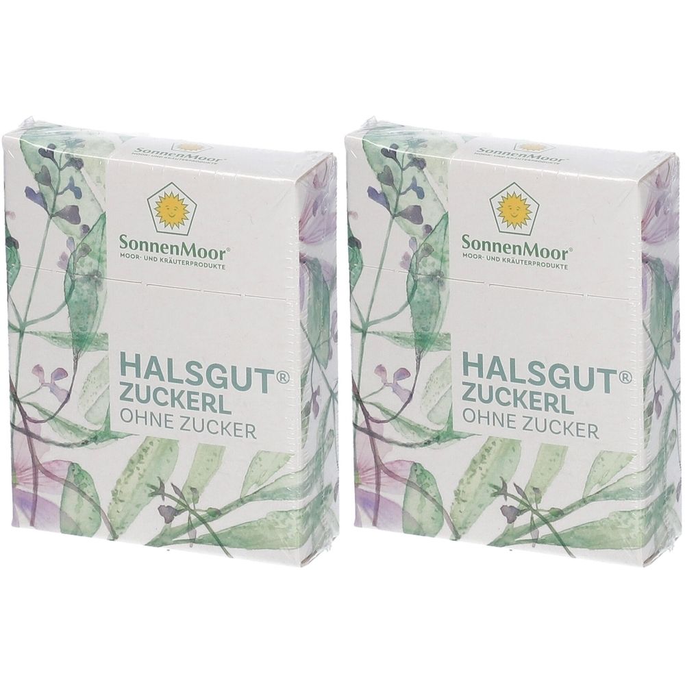 Zwei Schachteln mit SonnenMoor Halsgut Zuckerl. Weiße Verpackung mit floralem Muster und Produktbezeichnung. Ohne Zucker.