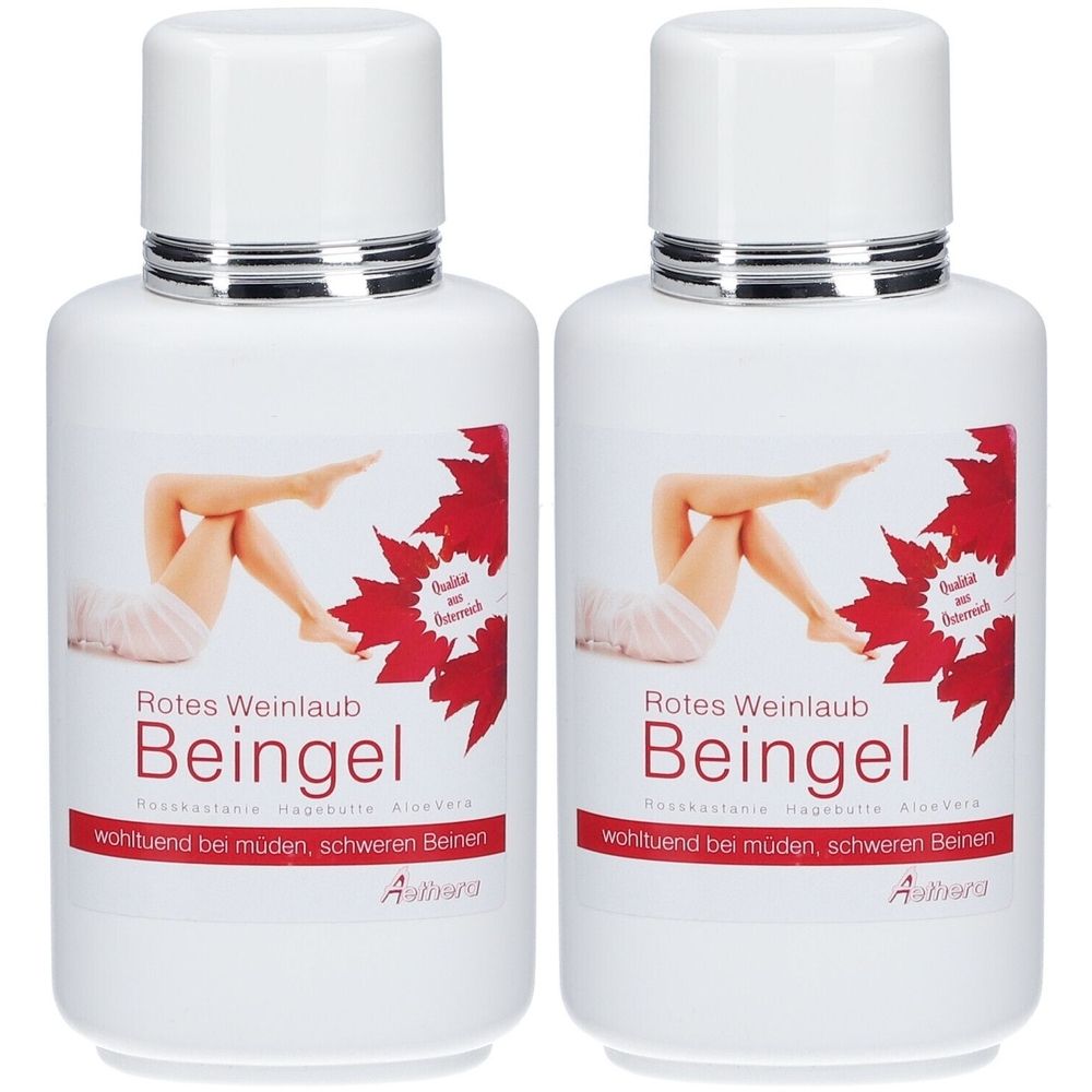 Deux flacons blancs avec étiquette rouge. Inscription: Rotes Weinlaub Beingel. Image de jambes. Fermeture argentée.
