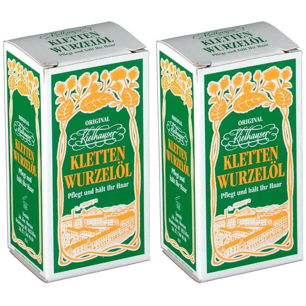 Zwei Kartons mit grüner und weißer Aufmachung. Aufschrift: ORIGINAL Kielhauser Kletten Wurzelöl. Text und florale Muster in Gold.