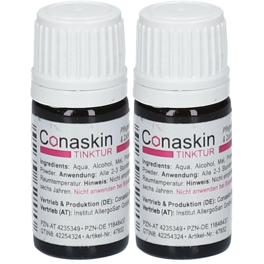 Deux petites bouteilles avec bouchons blancs et étiquettes noires. L'étiquette indique "Conaskin TINKTUR".