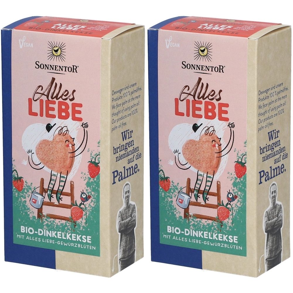 Deux boîtes "SONNENTOR Alles LIEBE". Illustration cœur, fraises, texte. Logo vegan.