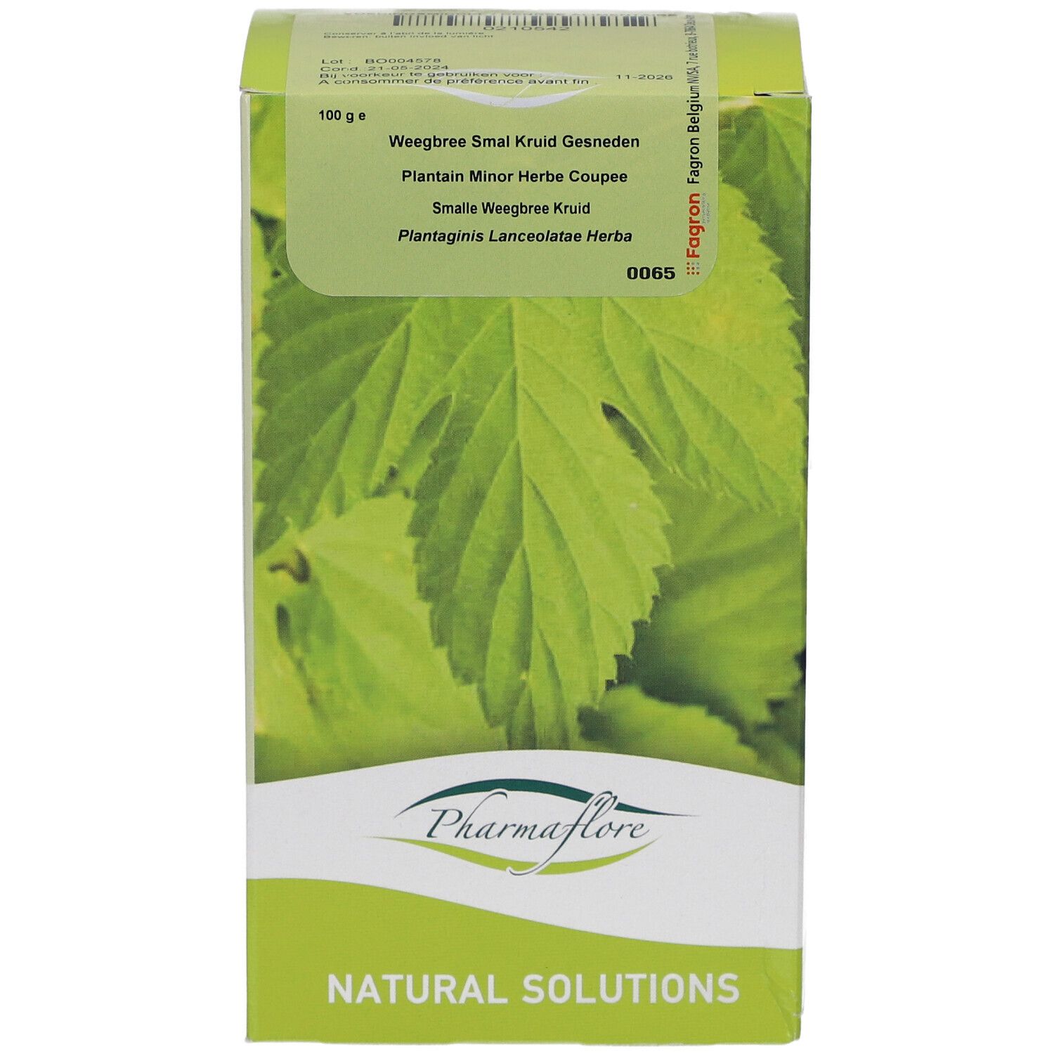 Pharmaflore-Verpackung mit Produktnamen und Blättern. Grün-weißes Design. Text in mehreren Sprachen.