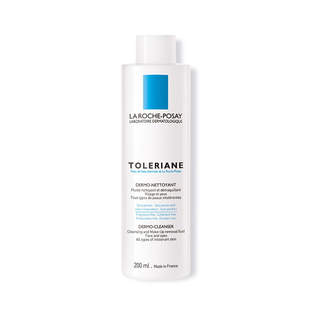 Weiße Flasche mit blauem Rechteck. Aufschrift: La Roche-Posay, Toleriane, Dermo-Cleanser, 200 ml.