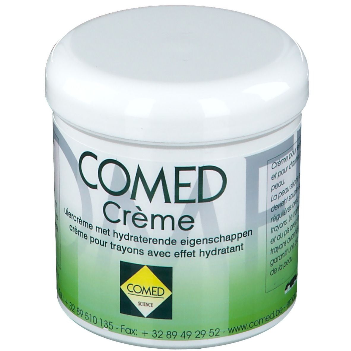 Weißer Tiegel mit grünem Etikett. Aufschrift: COMED Crème. Text in Deutsch, Französisch und Niederländisch. Gelbes Logo.