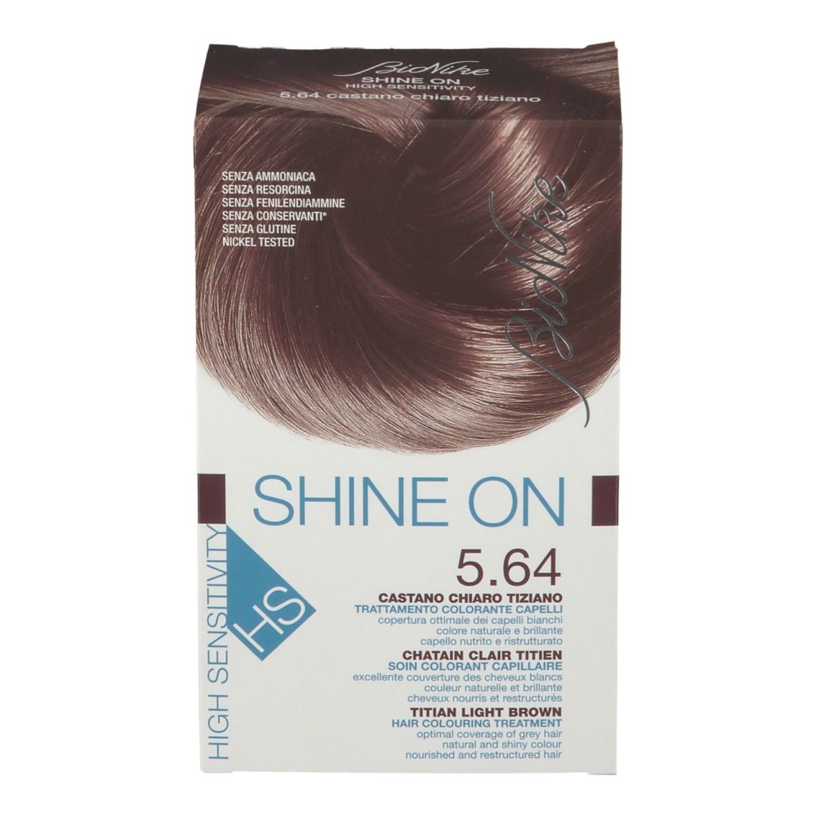 Haarfarbe-Box. Marke Bionike, Produktname Shine On 5.64. Kastanienbraun. Ohne Ammoniak, Resorcin, Konservierungsstoffe, Gluten. Nickel getestet.