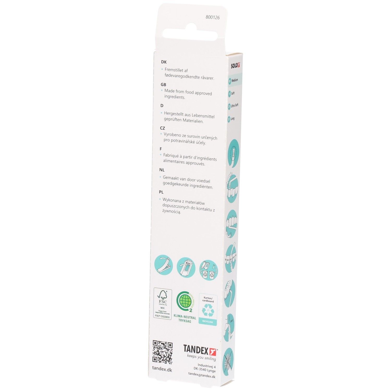 Rückseite der Zahnbürstenverpackung. Text in verschiedenen Sprachen. Marke: Tandex Solo. Mit FSC- und Recycling-Symbolen.
