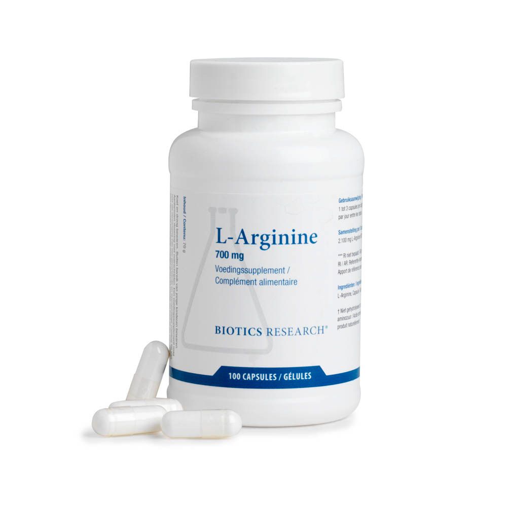 Flacon blanc de L-Arginine 700 mg. Inscription Biotics Research. 100 gélules. Quelques gélules à côté.
