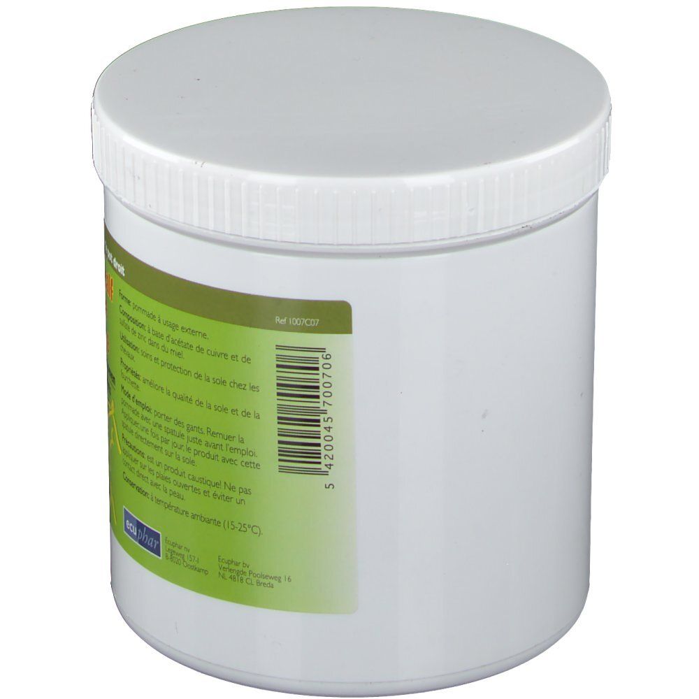 Pot blanc avec étiquette verte et code-barres. Vue arrière. Texte en français et néerlandais.