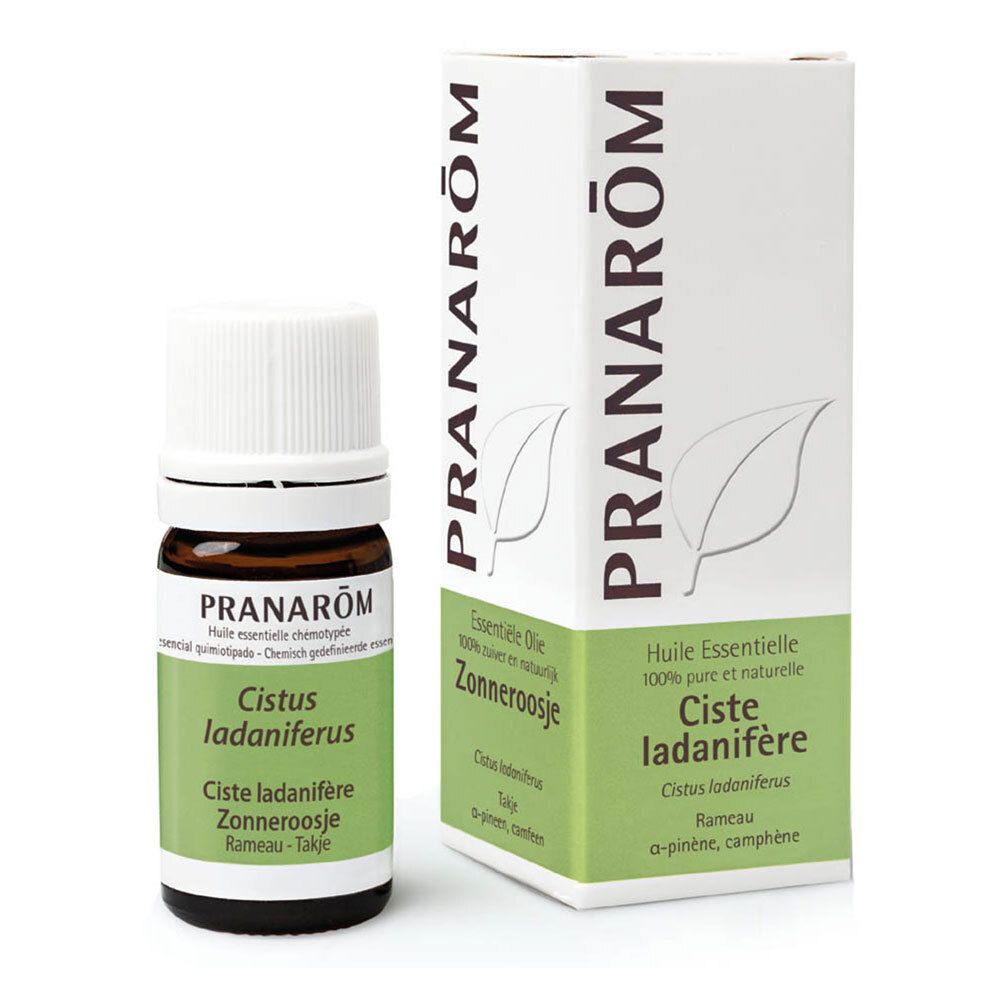 Braune Glasflasche und Schachtel. Schachtel und Flasche mit Produktnamen und Marke: PRANAROM. Weißer Deckel.