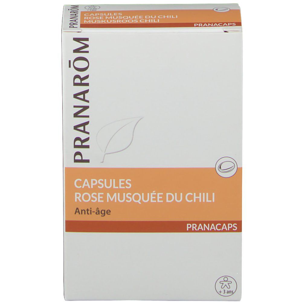 Kartonverpackung, weiß und orange. Aufschrift: Pranarom, Capsules Rose Musquée du Chili, Anti-âge. Logo.